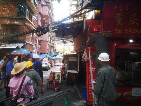宜昌市、西陵区侨联在联系社区组织开展综合整治行动