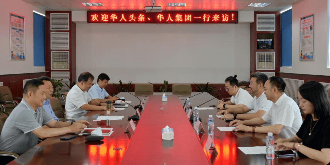 施政会见华人头条董事长黄其旺一行